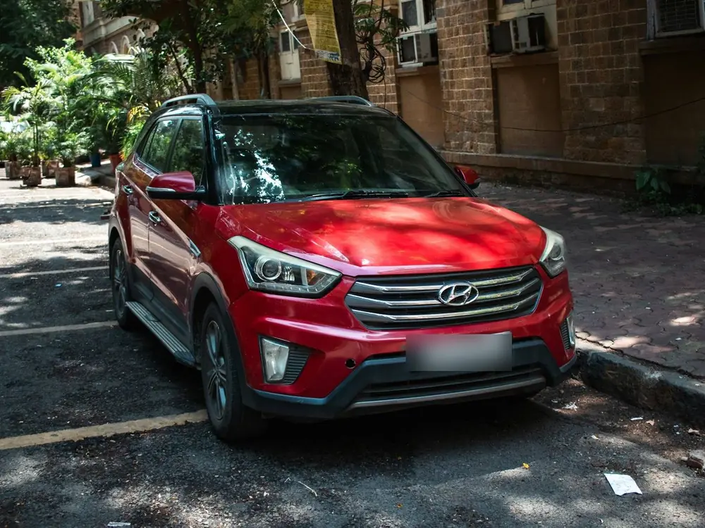 Red Hyundai Creta with Indian number plates